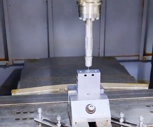 High-Pressure Water Jet Deburring of Manifold Blocks