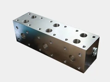 Hydraulic manifold block for high‑pressure oil & gas systems