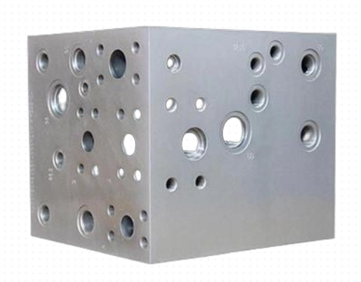 Anodized aluminum manifold block with complex internal passages, excellent machinability and heat dissipation